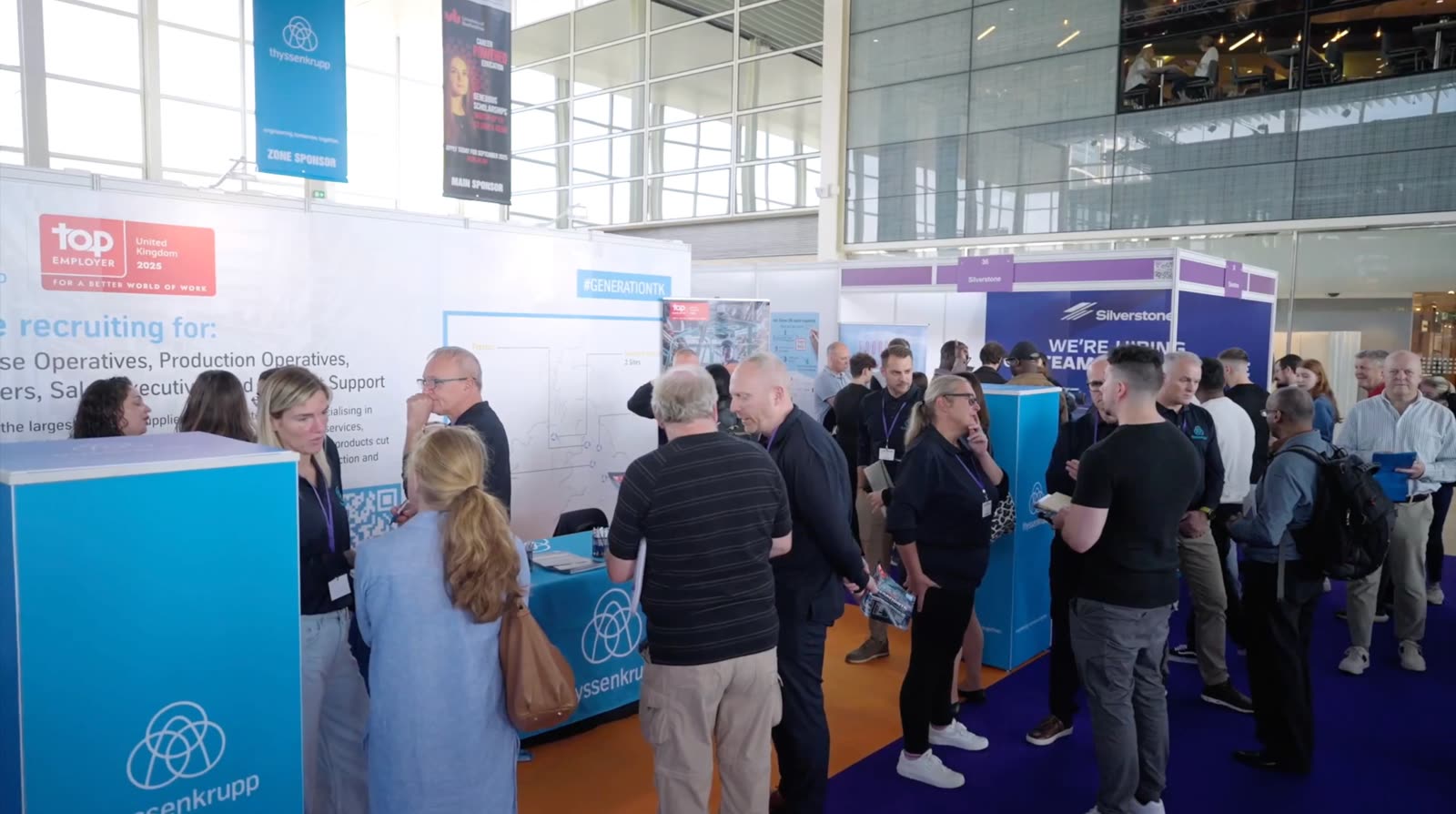 A visitor being helped at the MK Job Show