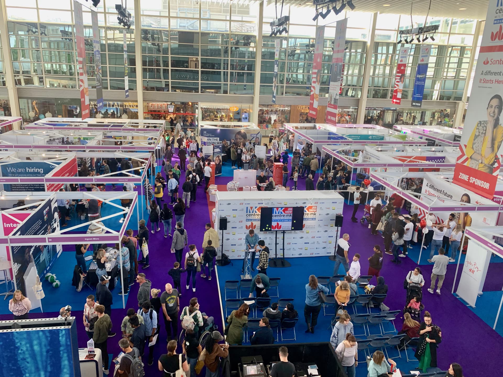 A busy MK Job Show floor with employers recruiting at centre:mk, Milton Keynes