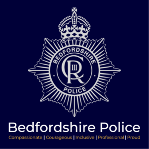 beds-police-logo-2023-full-portrait-light-on-dark-rgb 2025